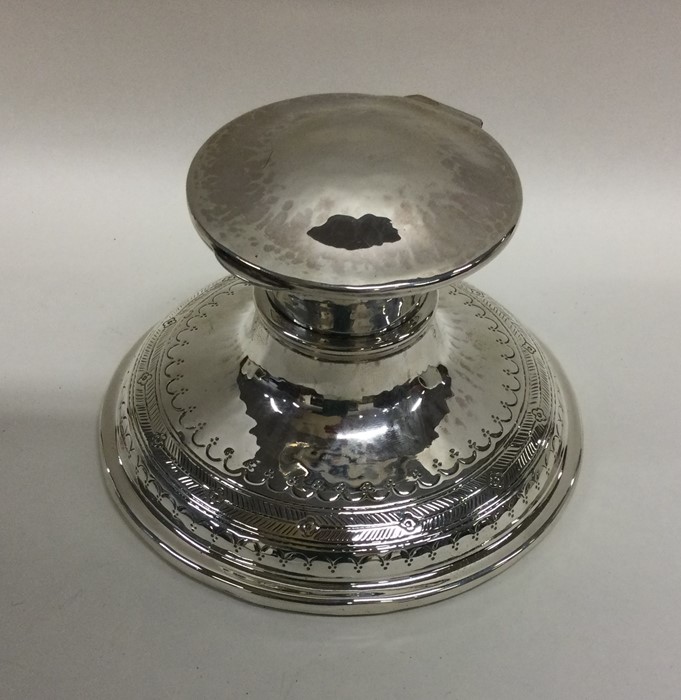 A stylish circular silver inkwell of Arts & Crafts - Image 2 of 3