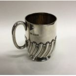 A silver half fluted christening cup. Sheffield. B