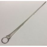 A heavy Georgian tapering silver meat skewer with