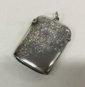 A floral decorated silver vesta case. Birmingham 1