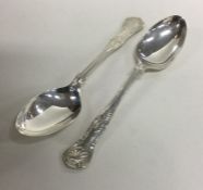 A pair of Kings' pattern silver dessert spoons. Lo