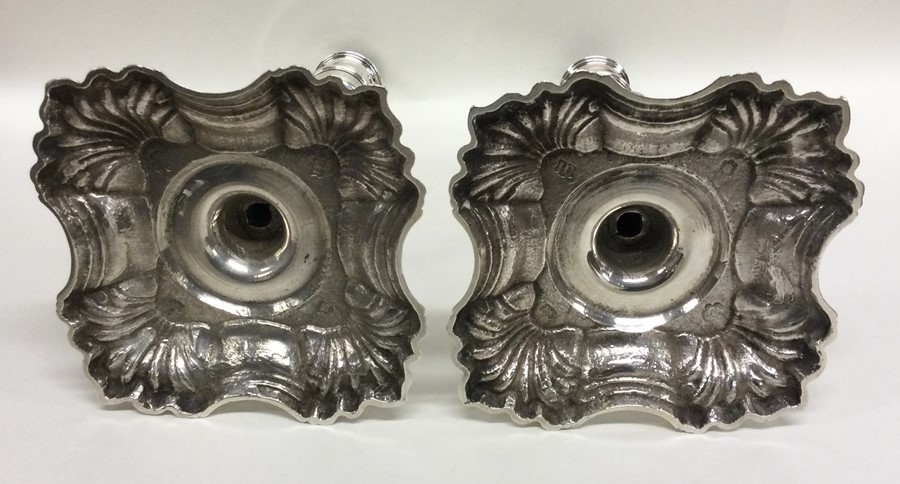 A good pair of Georgian cast silver candlesticks o - Image 3 of 3