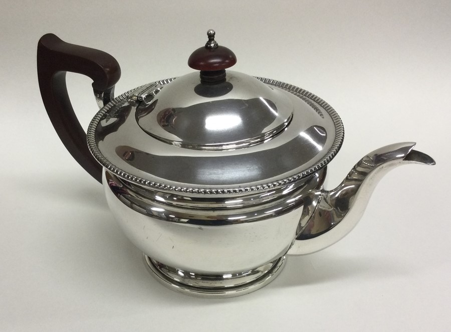 An Edwardian silver teapot. Birmingham 1936. By As - Image 2 of 2