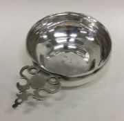 A rare William and Mary silver bleeding bowl with