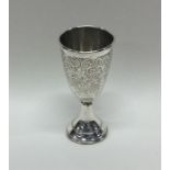 A large engraved silver Kiddush cup decorated with