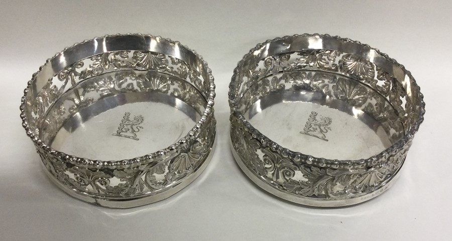 A good pair of Georgian silver coasters profusely - Image 2 of 2