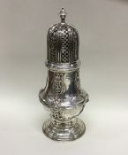 A massive fine quality silver caster engraved with