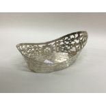 A heavy Continental silver pierced basket with bea