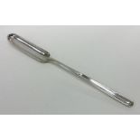 A heavy George III crested silver marrow scoop. Lo