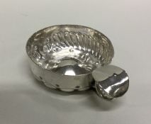 A large French silver wine taster of fluted design