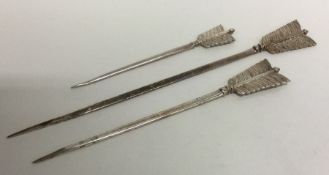 A graduated set of three silver plated meat skewer