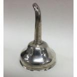 A heavy Georgian silver wine funnel with crested s