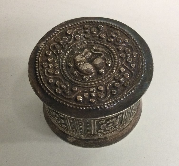 An Eastern silver cylindrical box decorated with a - Image 2 of 2