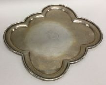 A rare hexafoil salver with central armorial. Lond