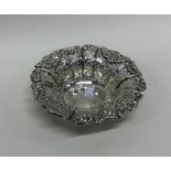 An Edwardian silver sweet dish with shaped edge. S