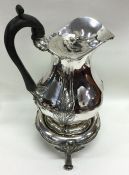 A fine George III acanthus silver jug on stand wit