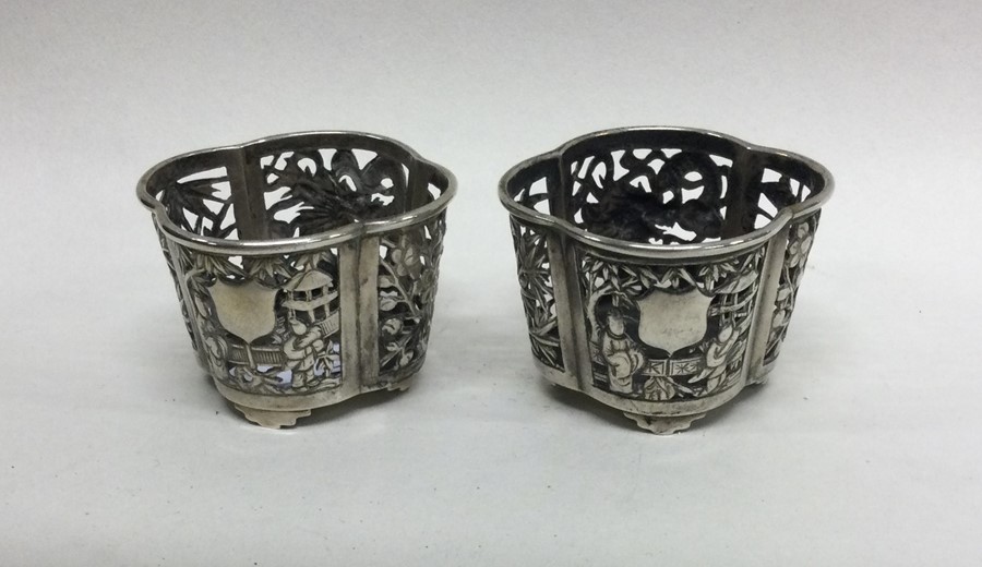 A good pair of Chinese silver salts of typical des