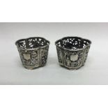 A good pair of Chinese silver salts of typical des