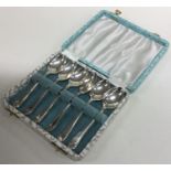 A cased set of six Edwardian silver teaspoons. She