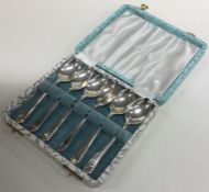 A cased set of six Edwardian silver teaspoons. She