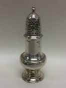 A heavy George III silver sugar caster. London 176