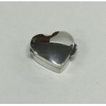 A modern silver heart shaped hinged top box. Appro