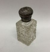 A silver mounted hobnail cut glass scent bottle wi