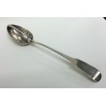 DUBLIN: An Irish silver straining spoon with crest