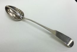 DUBLIN: An Irish silver straining spoon with crest