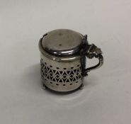 An Edwardian silver hinged top mustard with BGL. B