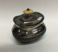 A silver plated half fluted tea casket. Est. £10 -