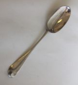 A George II silver bottom marked spoon with shell