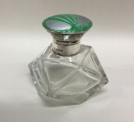 A stylish green enamel scent bottle with silver hi