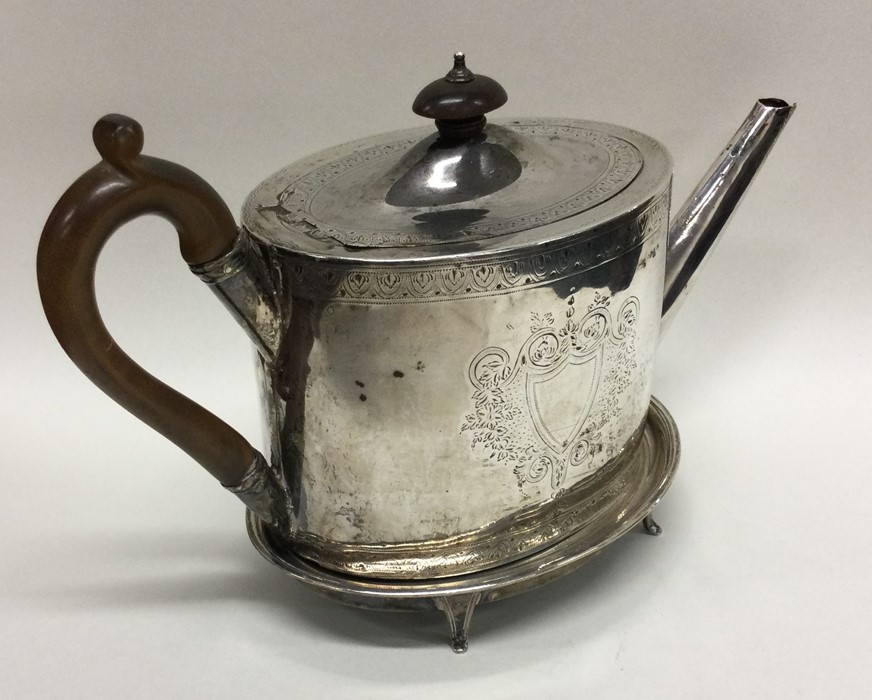 A good oval Georgian silver teapot on matched stan - Image 2 of 3