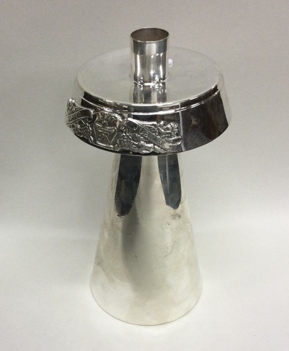 A stylish silver Jubilees candlestick of tapering