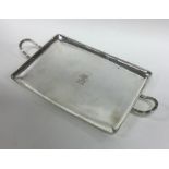 An attractive Georgian silver bacon tray with cres