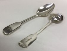 EXETER: A good pair of crested silver serving spoo