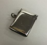 An Edwardian silver hinged top vesta case. Birming