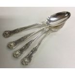 A set of four Kings' pattern silver dessert spoons