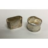 Two heavy silver napkin rings. Various dates and m