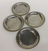 A heavy set of four Continental silver dishes. App