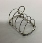 A silver four bar toast rack. Birmingham 1916. By