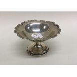 An Edwardian silver bonbon dish of shaped form. Bi