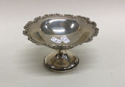 An Edwardian silver bonbon dish of shaped form. Bi