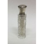 A silver mounted and cut glass scent bottle. Londo