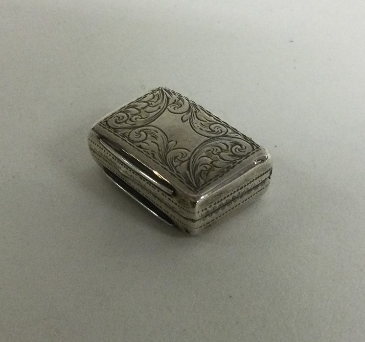 A small Georgian silver vinaigrette with fitted in