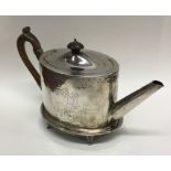 A good oval Georgian silver teapot on matched stan