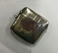 An engine turned silver vesta case with hinged lid