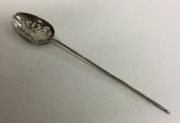 A good tapering silver mote spoon with pierced bow