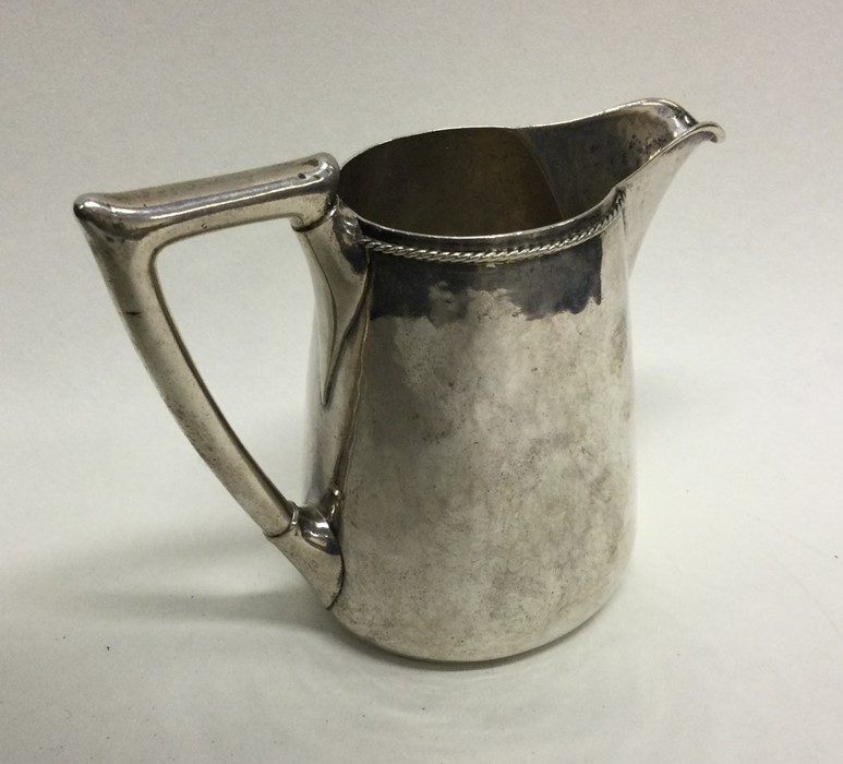 A heavy Continental silver tapering cream jug. App